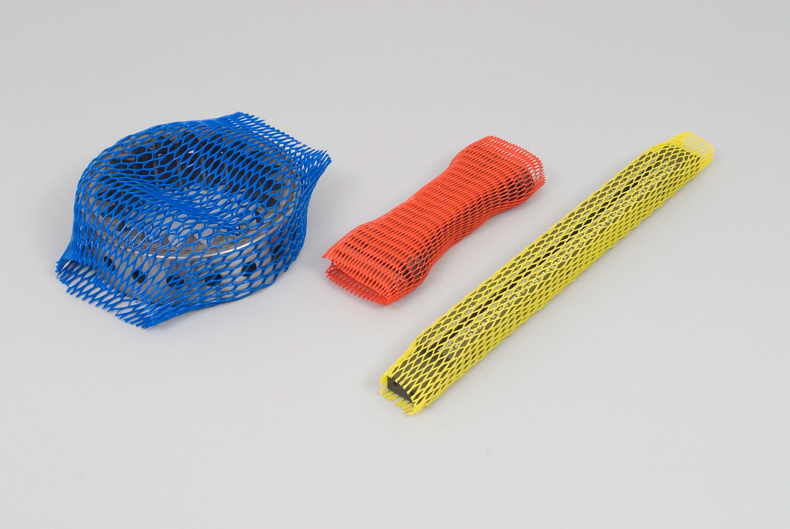 Kunststoff-Oberflächenschutznetze in orange blau und gelb